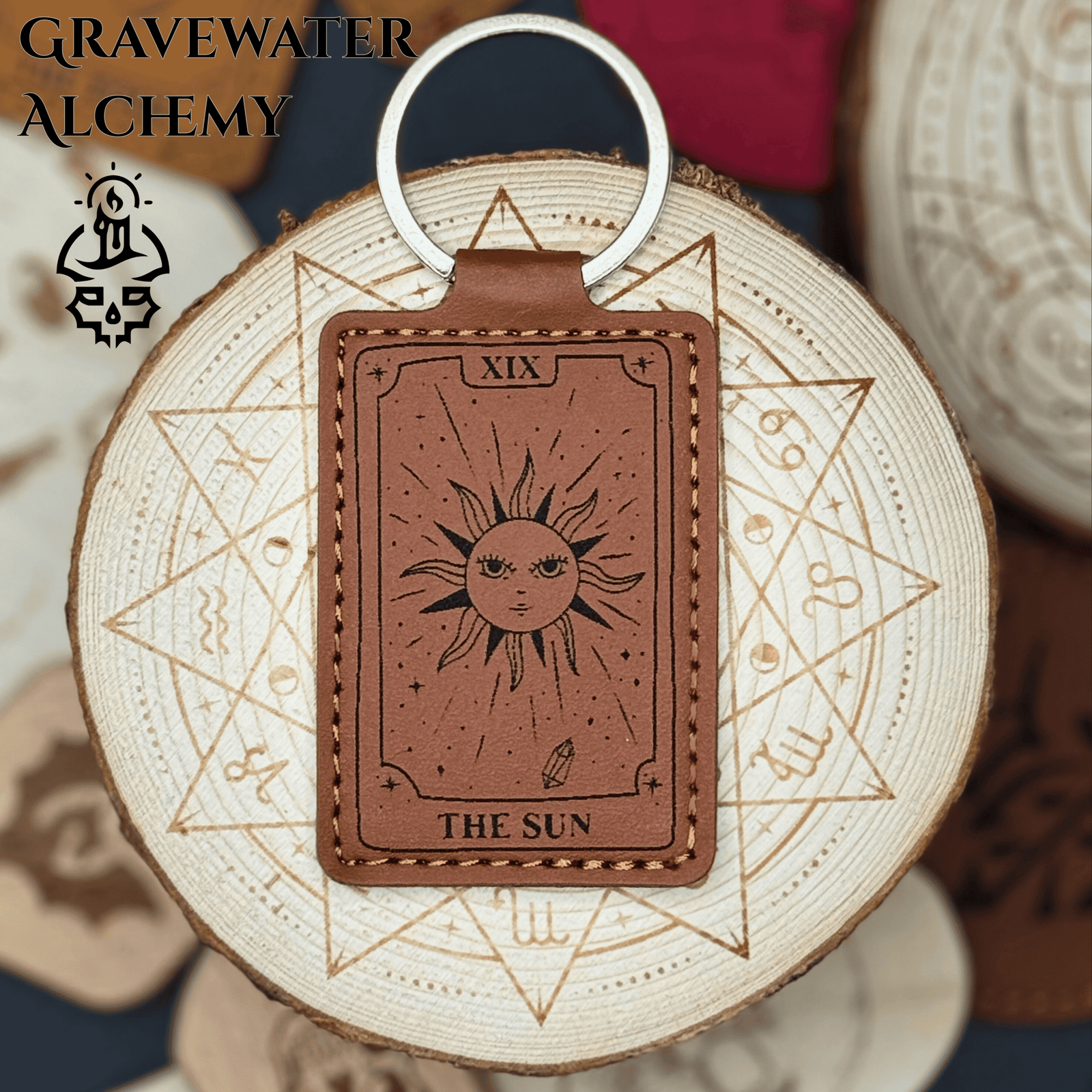 Engraved leather Tarot keychain featuring The Sun card design by Gravewater Alchemy.