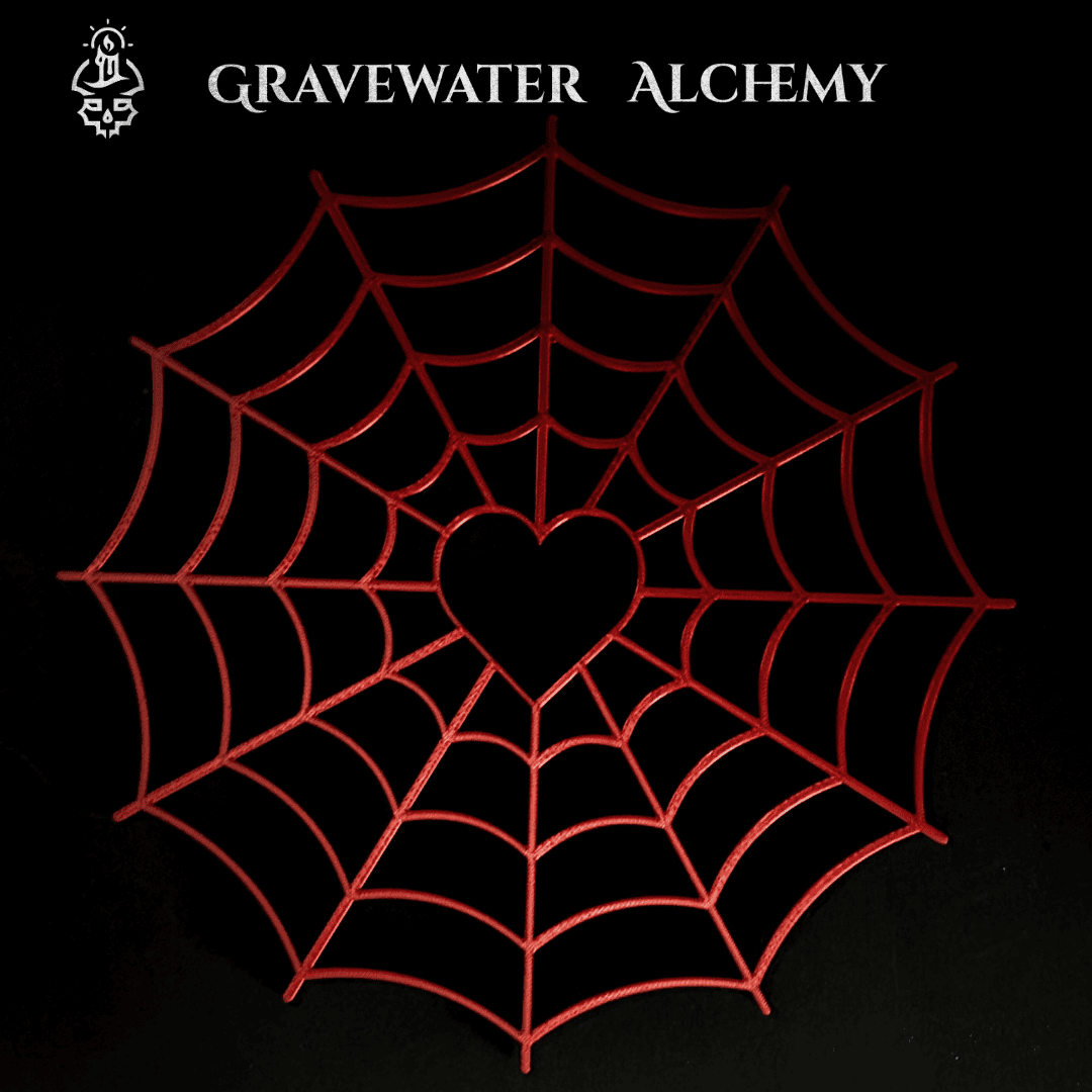 2D 3D printed spiderweb wall art with heart center by Gravewater Alchemy